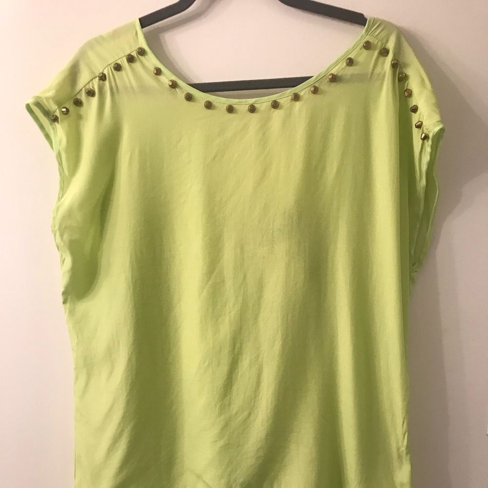 High low green top with gold stud detail.